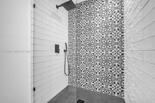 a bathroom with a shower curtain