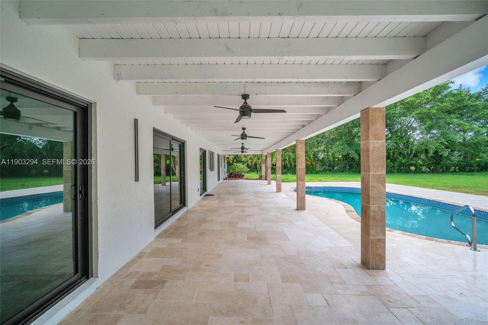 11476 Sundance Lane Boca Raton, FL 33428 - Photo 43 of 45 a view of a porch and garden