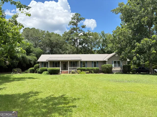 a view of furniture and wooden floor