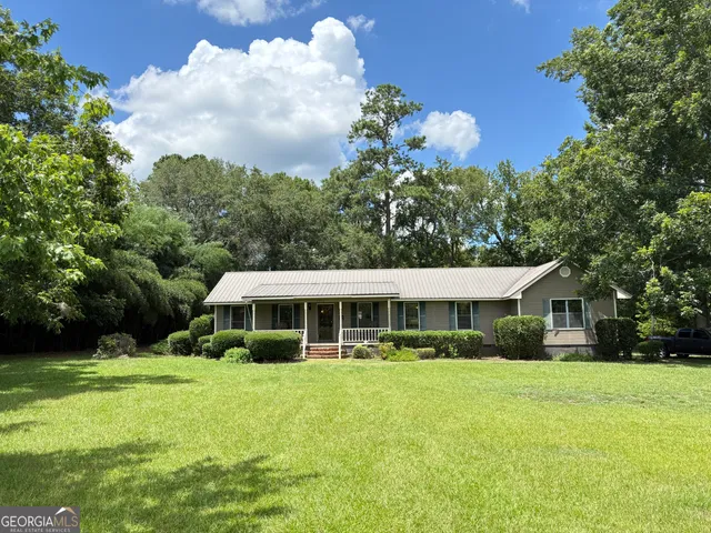 a room with furniture and a window