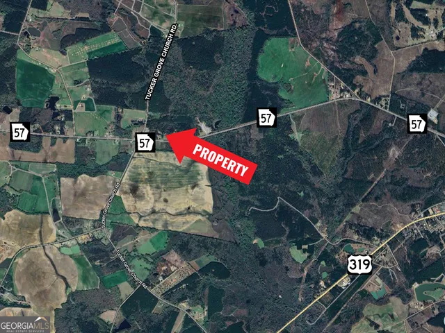 an aerial view of a house having yard