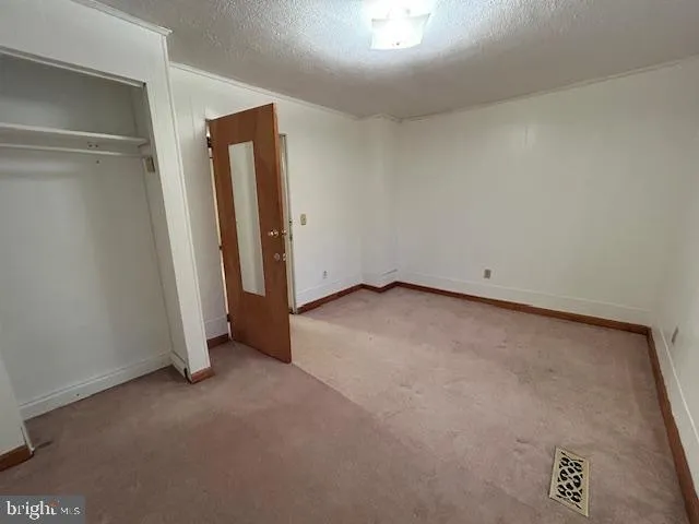 an empty room with closet