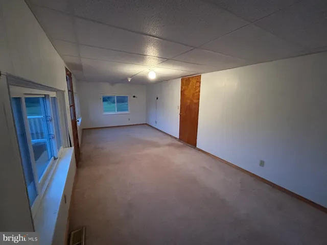 a view of hallway and stairs