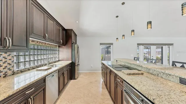 a view of empty room with floor to ceiling windows
