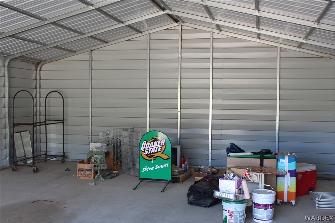 3635 Bowie Road Golden Valley, AZ 86413 - Photo 13 of 15 a view of a room with shelves