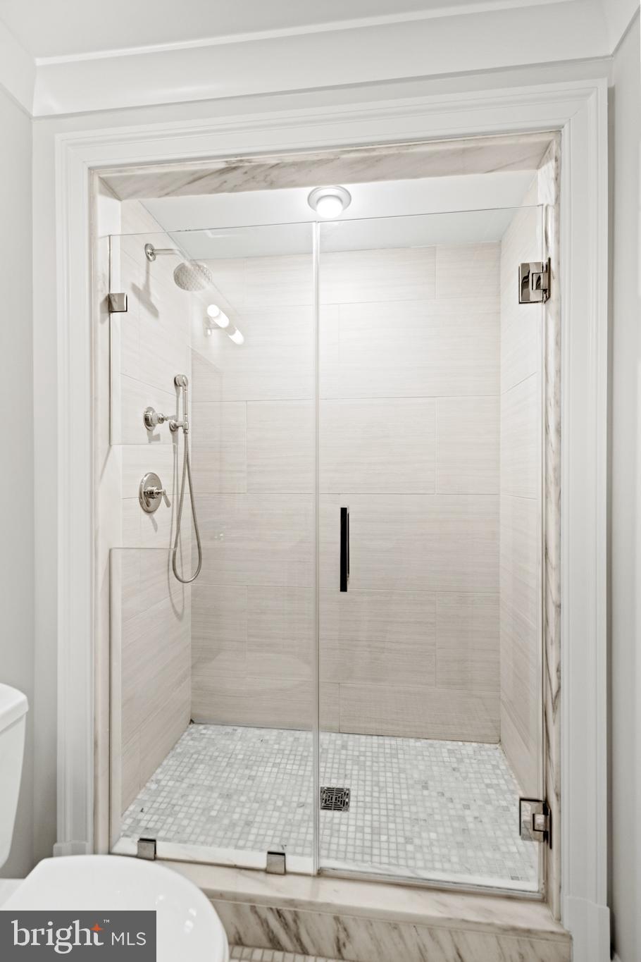 1108 16th Street Northwest, Unit 504 Washington, DC 20036 - Photo 14 of 22 a bathroom with a shower