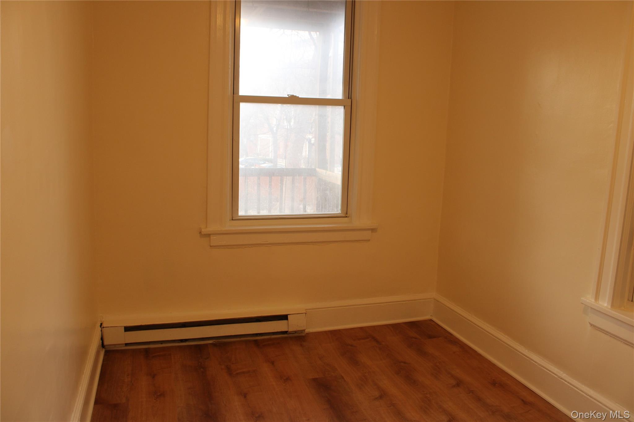 52 South Bridge Street, Unit 1 Poughkeepsie, NY 12601 - Photo 22 of 27 a view of a small space with wooden floor and a window