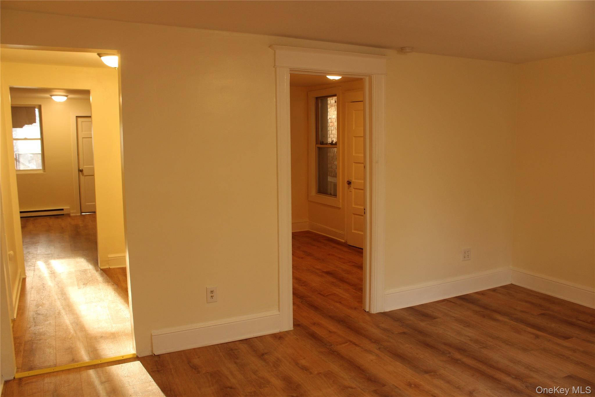 52 South Bridge Street, Unit 1 Poughkeepsie, NY 12601 - Photo 10 of 27 a view of a hallway with wooden floor