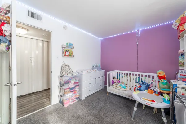 a bedroom with furniture and a couch