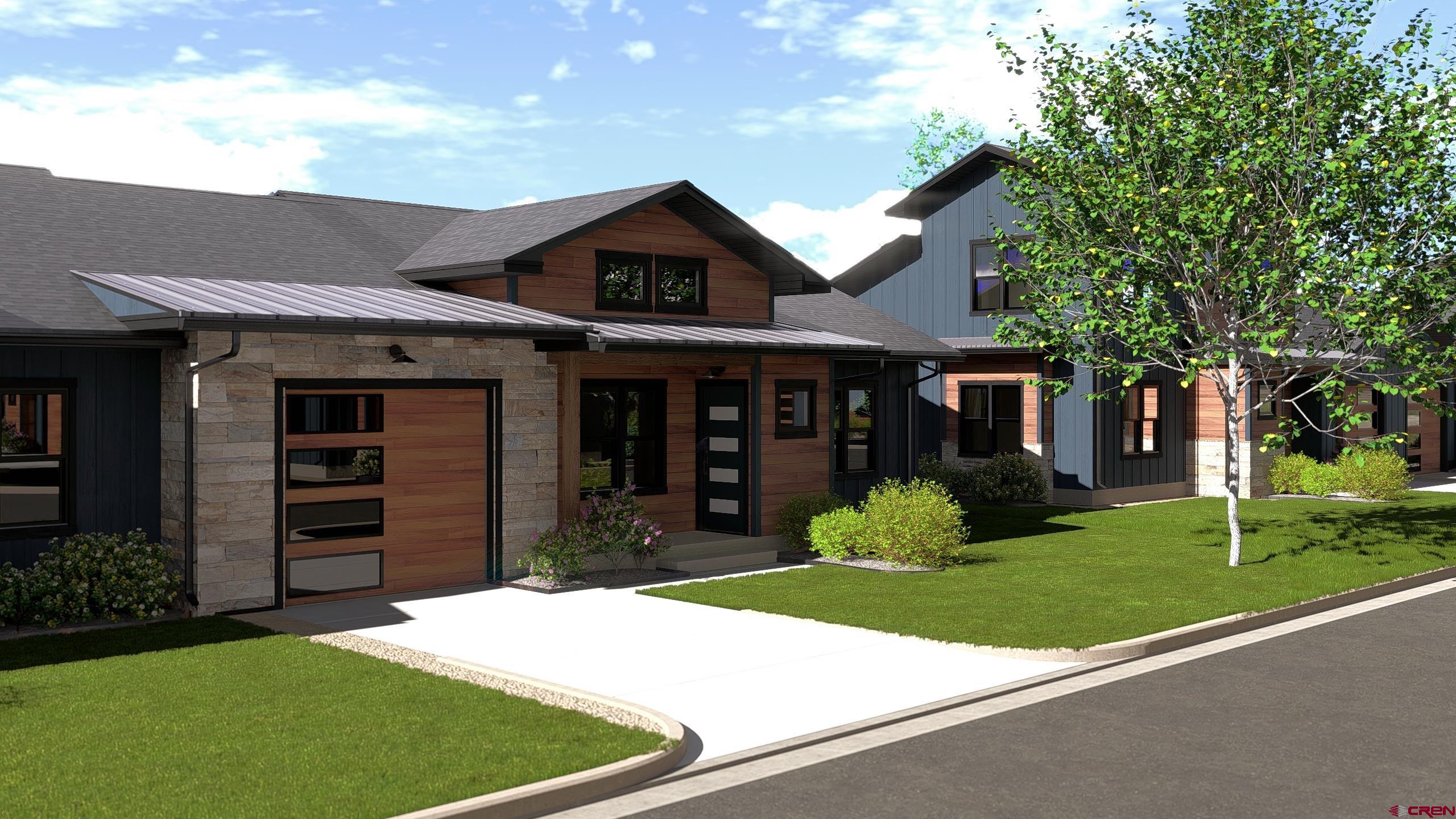 Lot 6 Rustic Row Montrose, CO 81401 - Photo 6 of 18 a front view of a house with a yard and garage