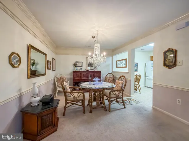 a view of a livingroom and dining room