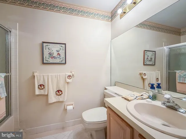 a view of storage and utility room with washer and dryer