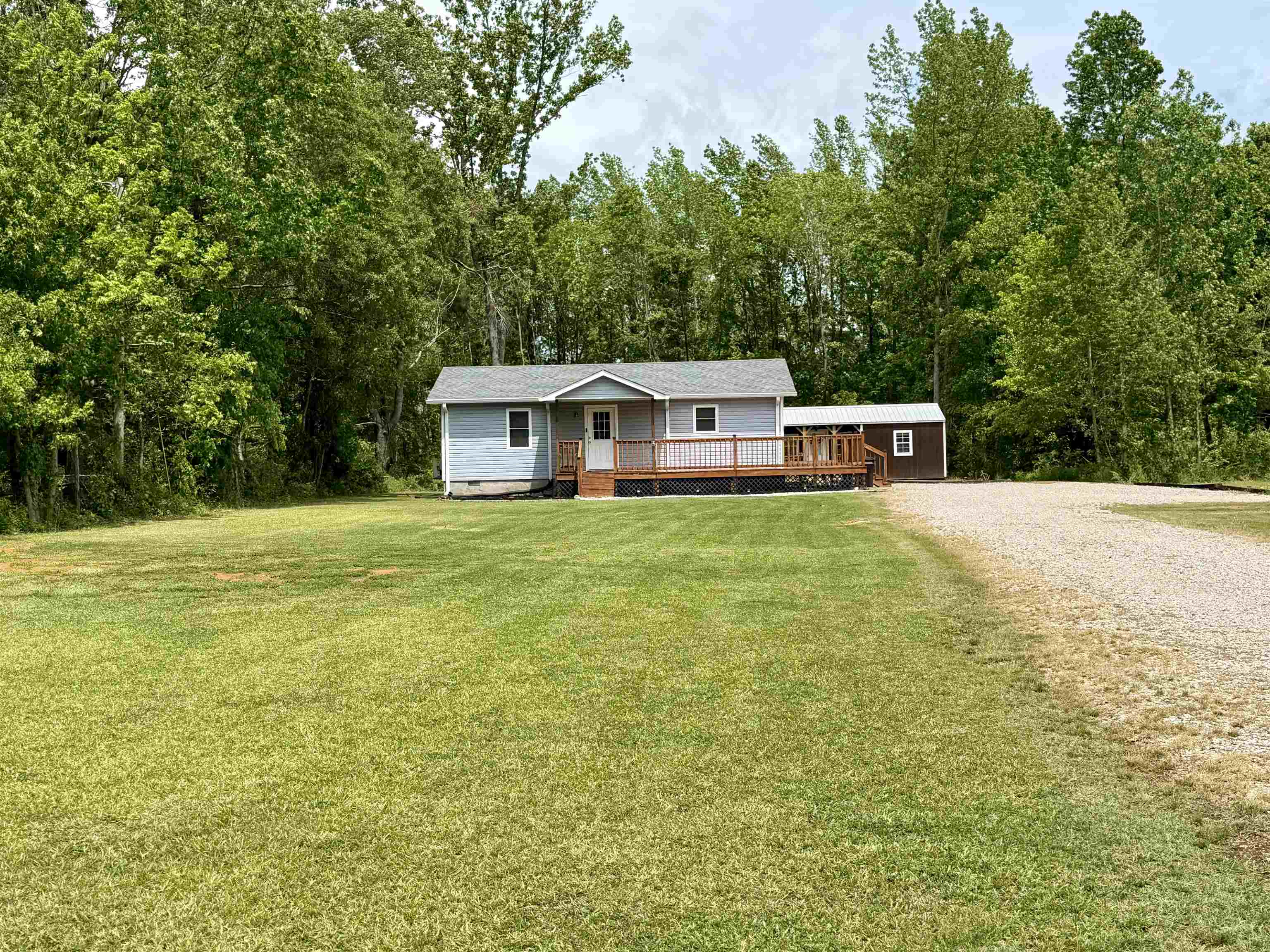 8022 45th Highway Ramer, TN 38367 - Photo 20 of 20 a view of a house with a big yard