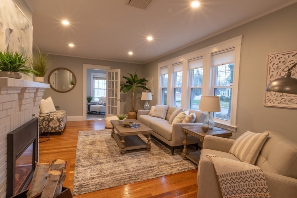76 Stevens Road Needham, MA 02492 - Photo 3 of 26 a living room with furniture and a large window