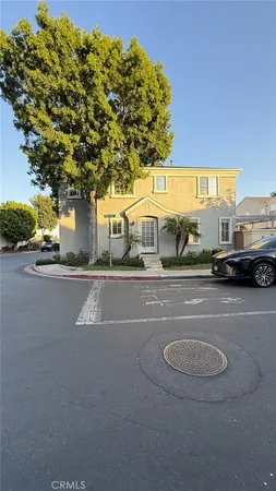 a view of a street with a building