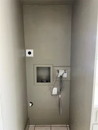 a picture of a bathroom with a shower