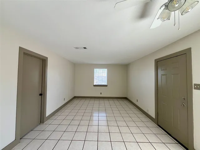 a view of an empty room with window
