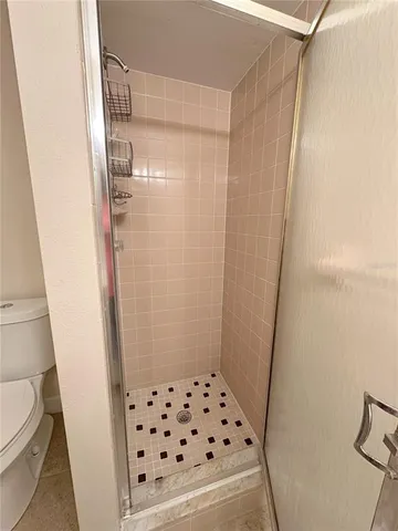 a bathroom with a sink and a shower