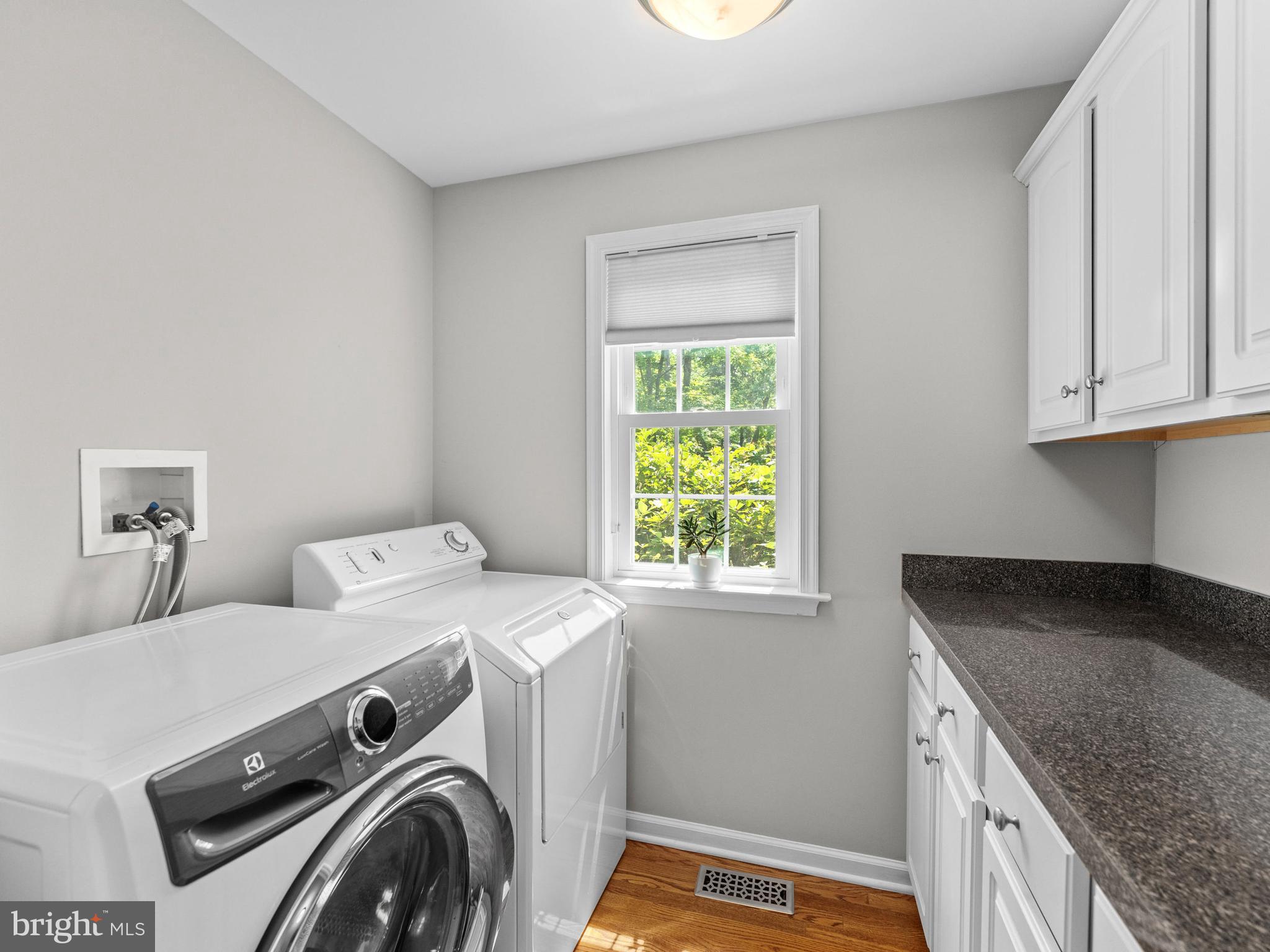 928 Township Line Road Chalfont, PA 18914 - Photo 44 of 60 Main Floor Laundry with storage