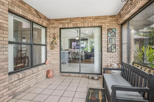 a view of a porch with a furniture