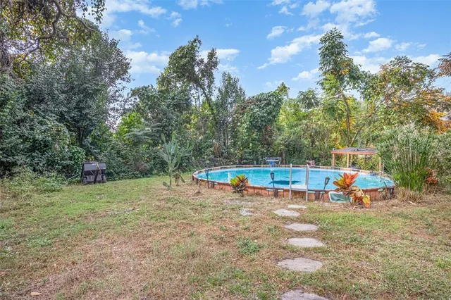 a view of a park with swings and slides