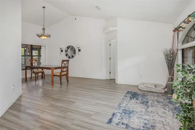 a view of a livingroom with furniture and entryway