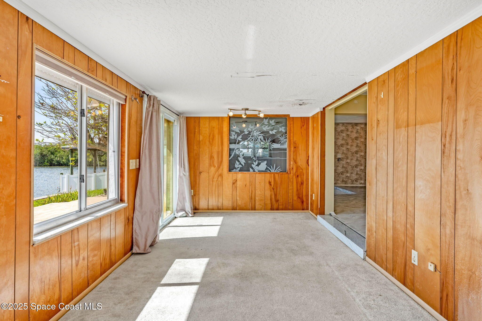 272 Bahama Boulevard Cocoa Beach, FL 32931 - Photo 24 of 63 a view of entryway with a front door