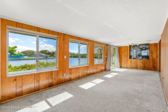 a view of a house with a big yard