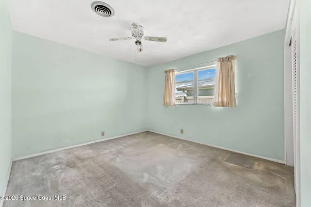 a view of a lake with a nearby beach