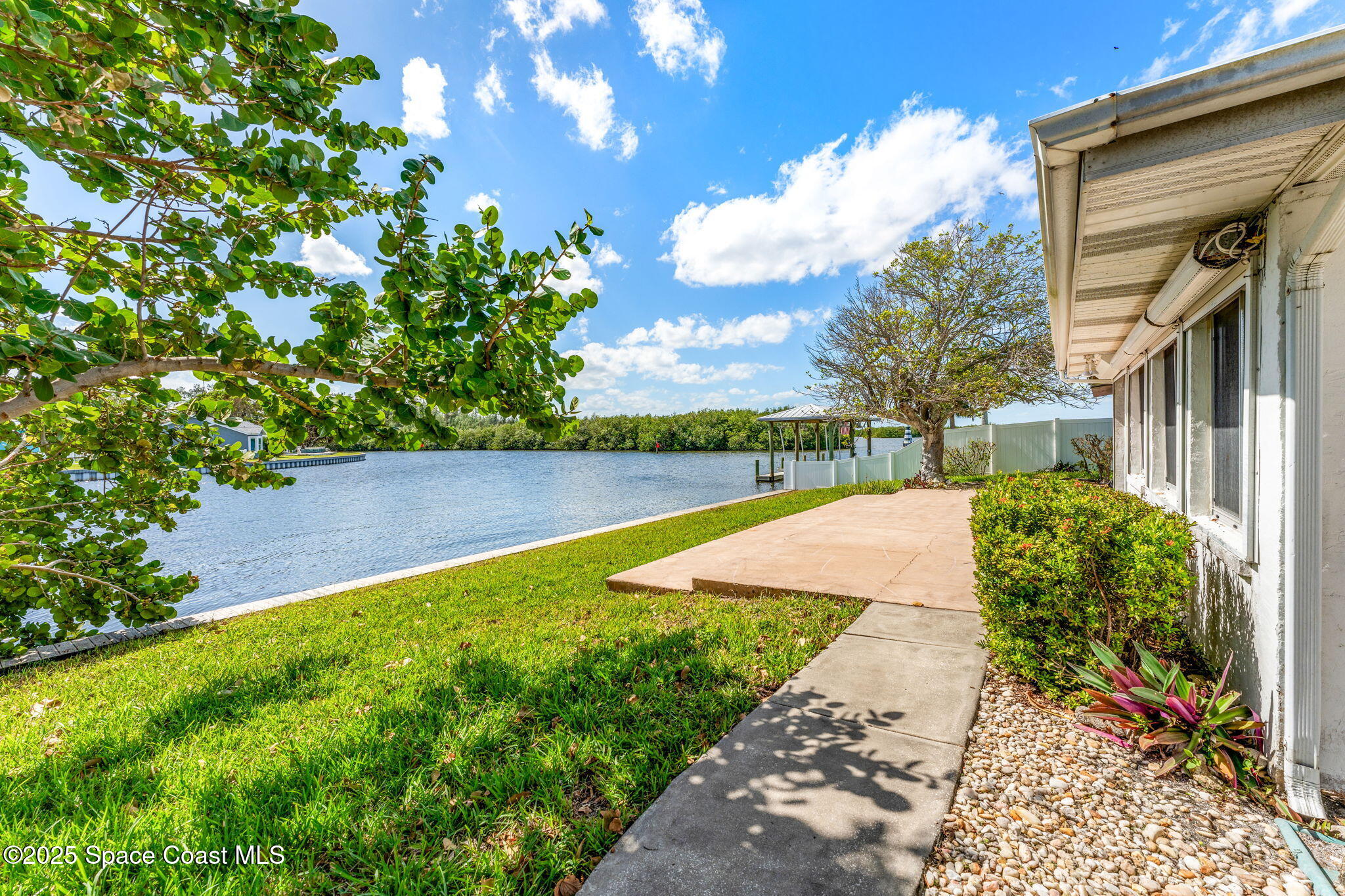 272 Bahama Boulevard Cocoa Beach, FL 32931 - Photo 38 of 63 a view of a backyard