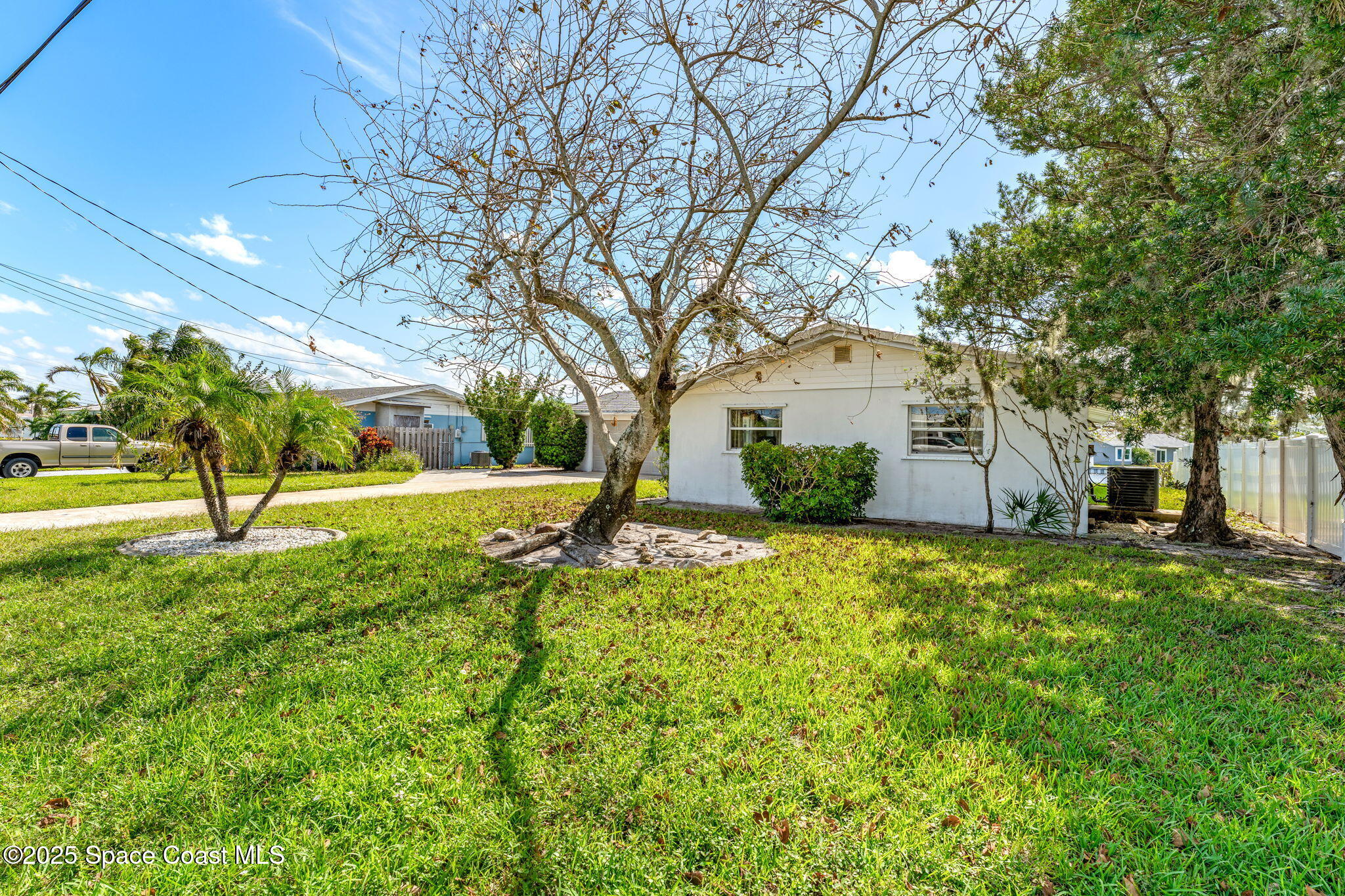 272 Bahama Boulevard Cocoa Beach, FL 32931 - Photo 44 of 63 a view of a house with a big yard