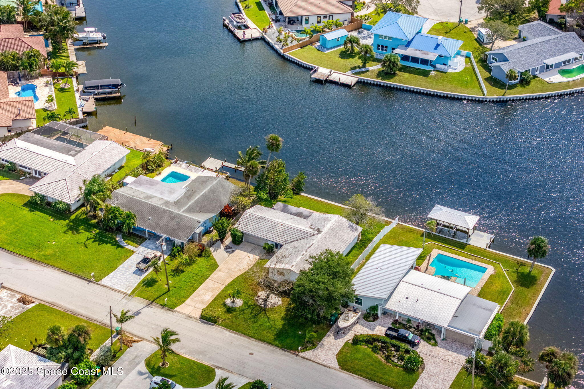 272 Bahama Boulevard Cocoa Beach, FL 32931 - Photo 53 of 63 an aerial view of a house with swimming pool