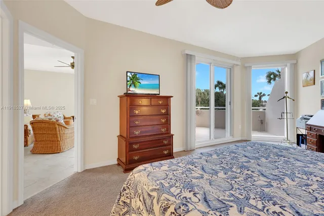a bathroom with a bathtub a sink and mirror