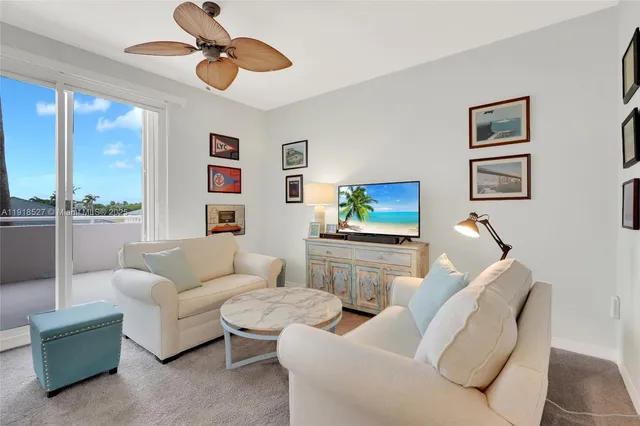 a kitchen with granite countertop a sink and cabinets