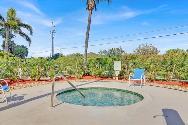 a living room with furniture and window