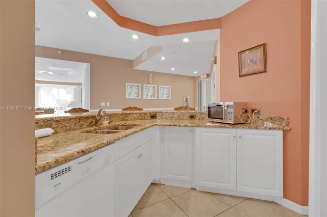 a view of balcony with wooden floor and fence