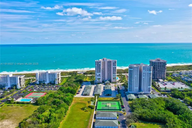 a view of a lake with a big yard