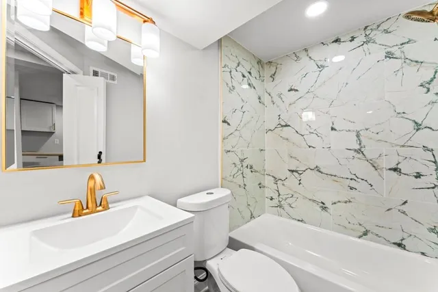 a room with wooden floor and window