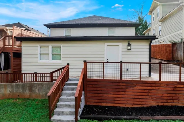 a front view of a house with parking space