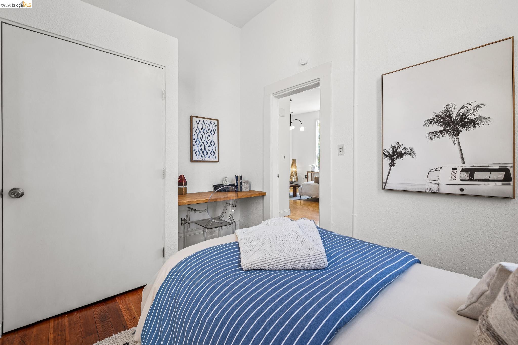 1655 12th Street Oakland, CA 94607 - Photo 20 of 51 a living room with furniture and wooden floor