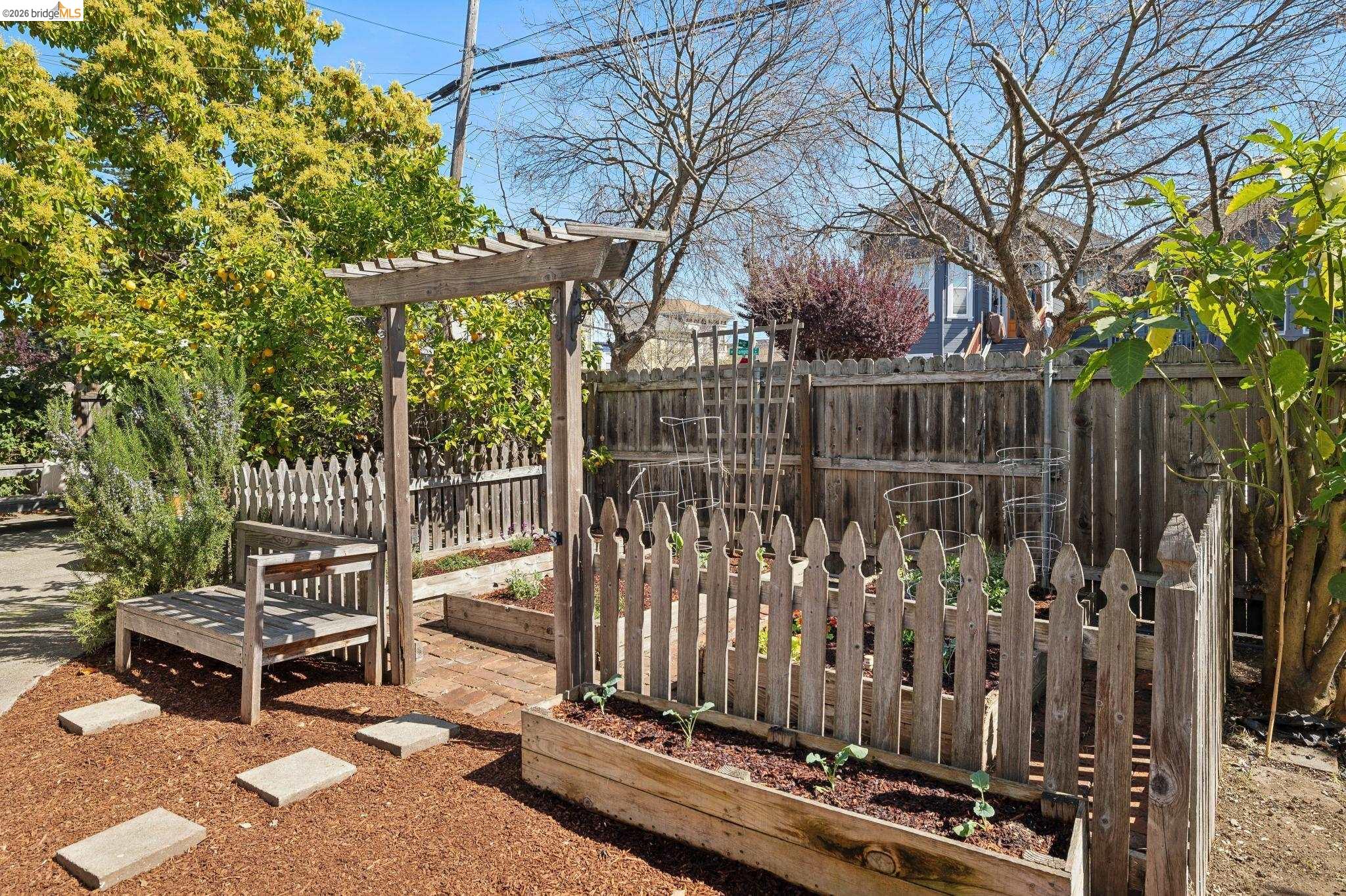 1655 12th Street Oakland, CA 94607 - Photo 32 of 51 a view of a bench with wooden fence