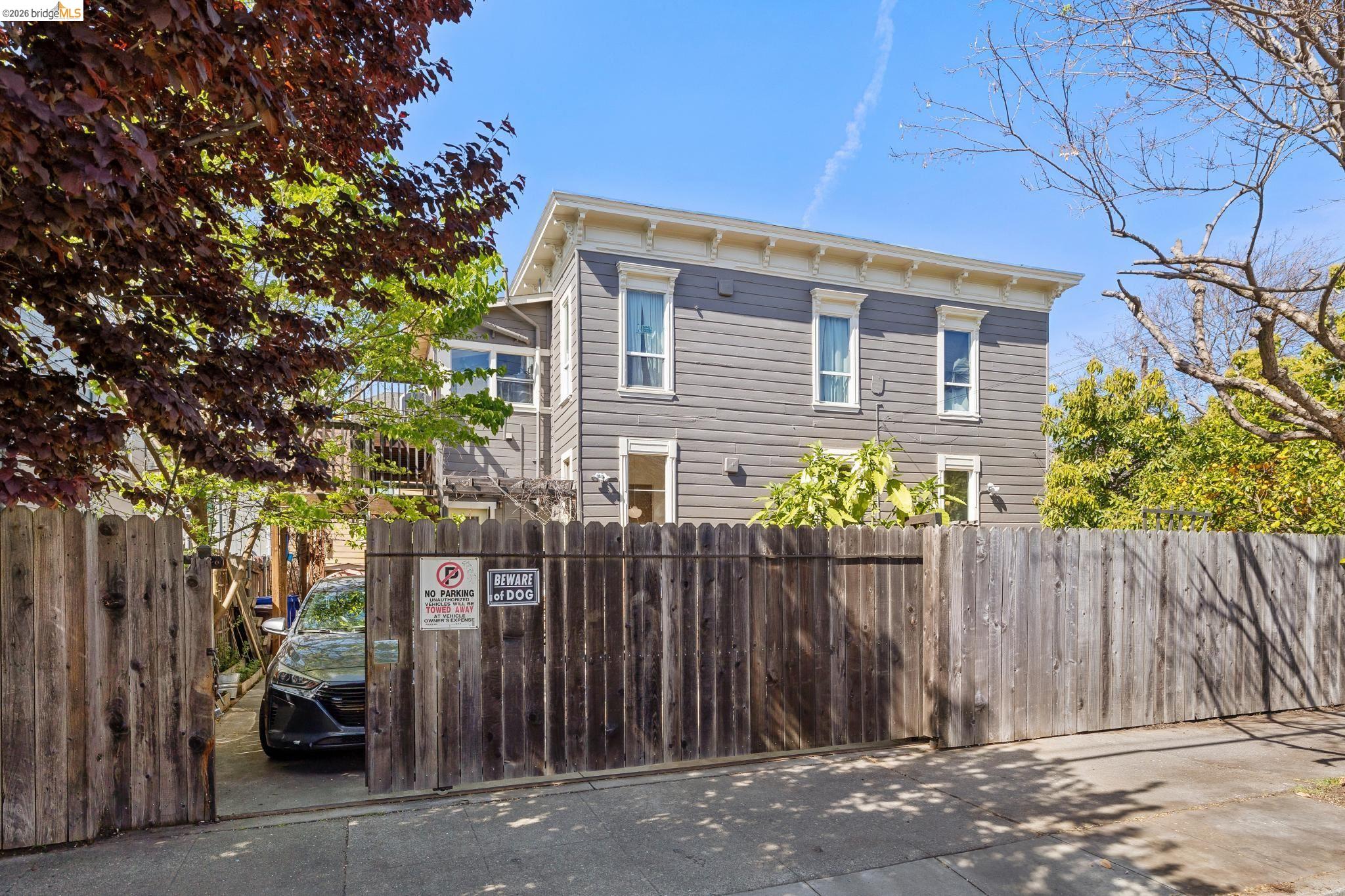 1655 12th Street Oakland, CA 94607 - Photo 34 of 51 a front view of a house with a garden
