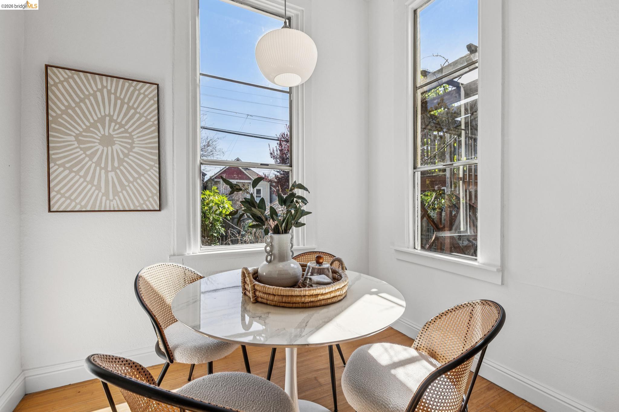 1655 12th Street Oakland, CA 94607 - Photo 10 of 51 a dining room with furniture and wooden floor
