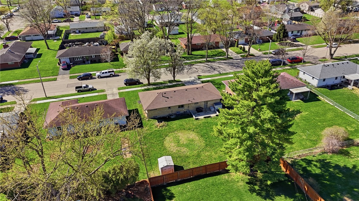 1325 Chelsea Road Troy, OH 45373 - Photo 4 of 42 An inviting aerial view showcases a vibrant neighborhood with well-maintained properties and lush green spaces.