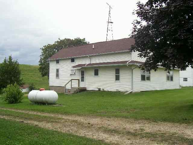 14895 East Kent School Road Kent, IL 61044 - Photo 3 of 3 a front view of a house with a garden