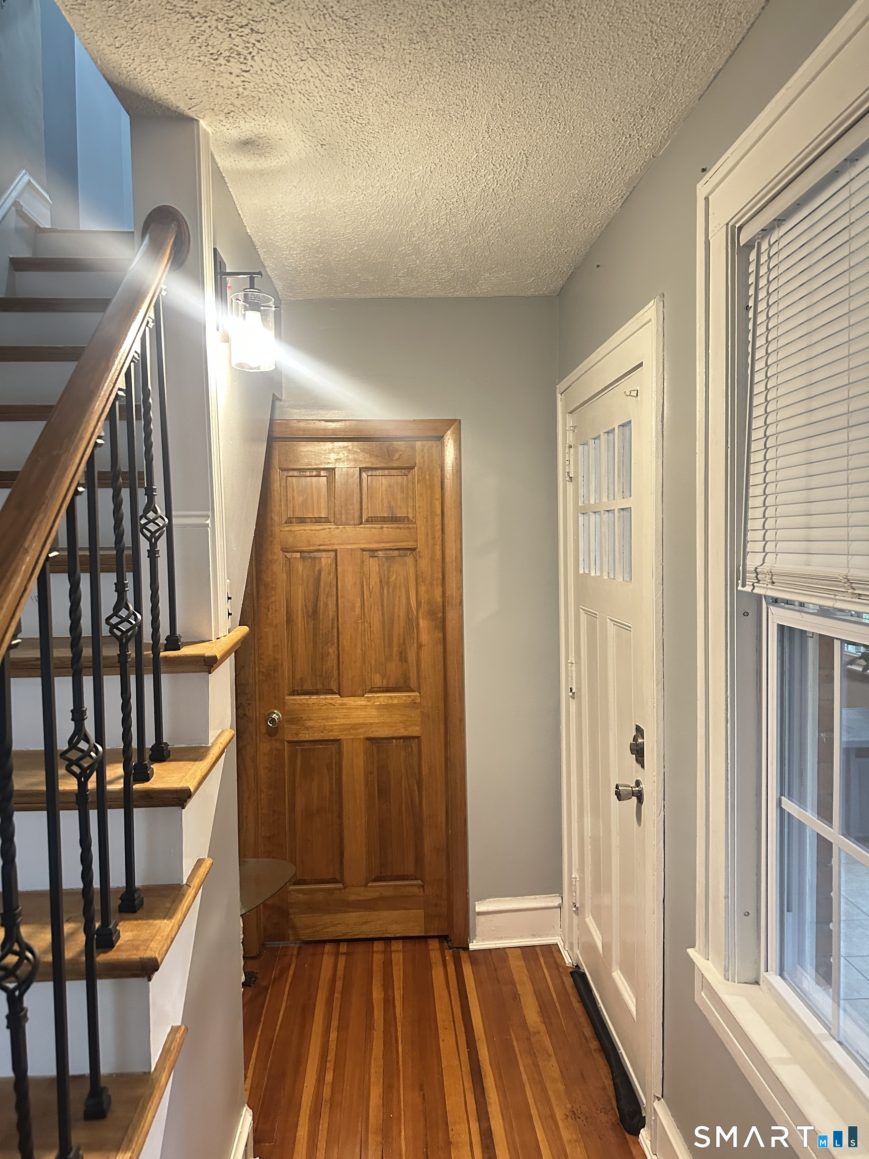 83 Faneuil Street Windsor, CT 06095 - Photo 5 of 14 a view of entryway with wooden floor