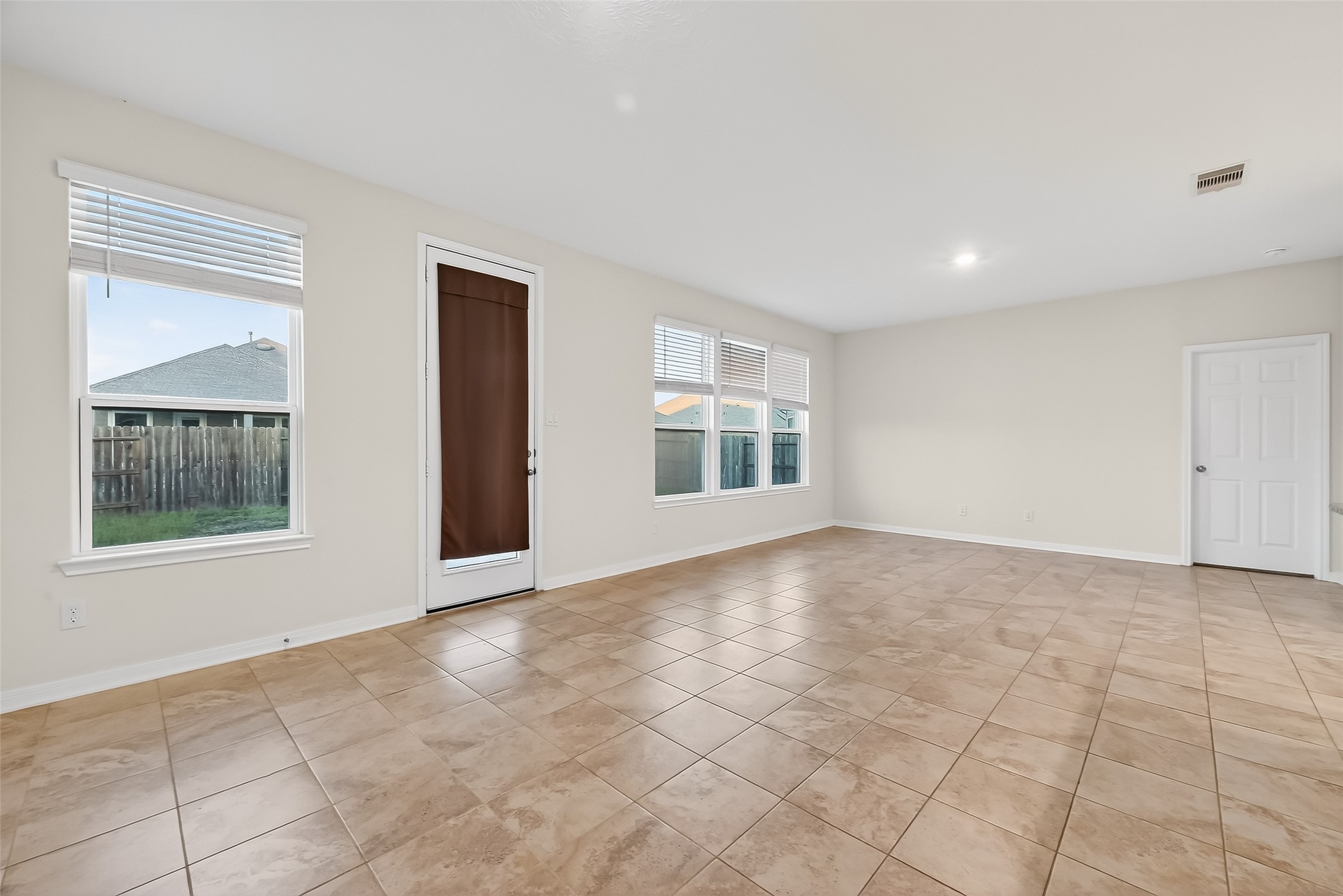 5907 Osprey Drive Rosenberg, TX 77469 - Photo 11 of 36 a view of an empty room with a window