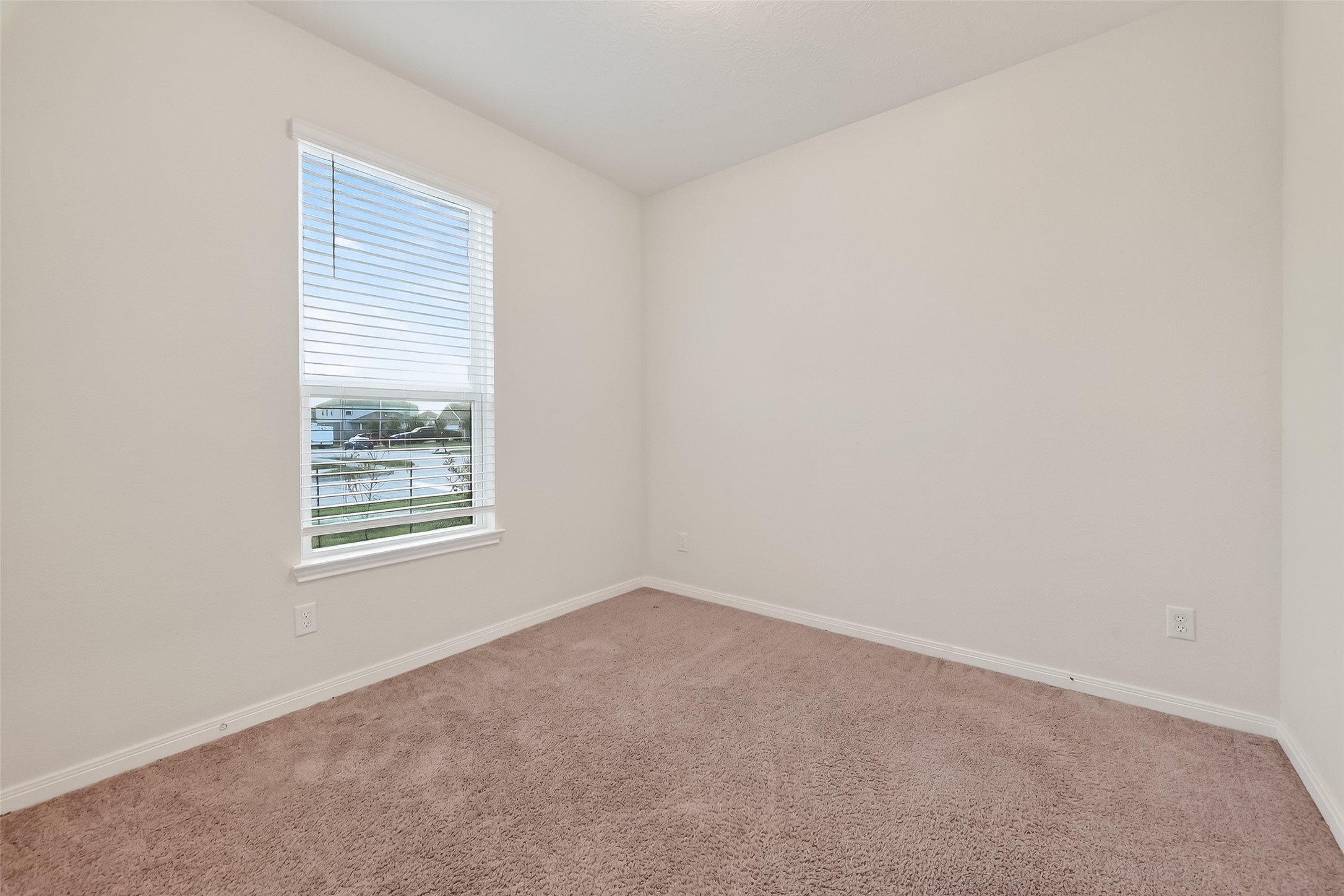 5907 Osprey Drive Rosenberg, TX 77469 - Photo 19 of 36 an empty room with a window