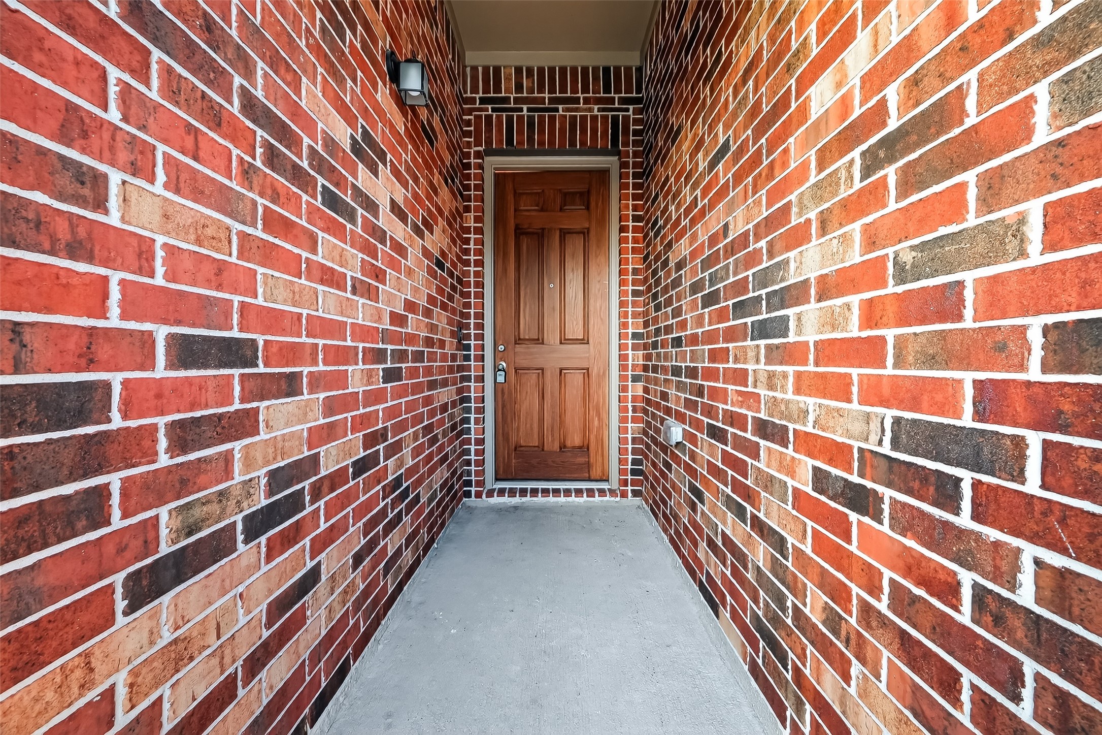 5907 Osprey Drive Rosenberg, TX 77469 - Photo 4 of 36 a view of wooden floor and a black car parked in front of a building