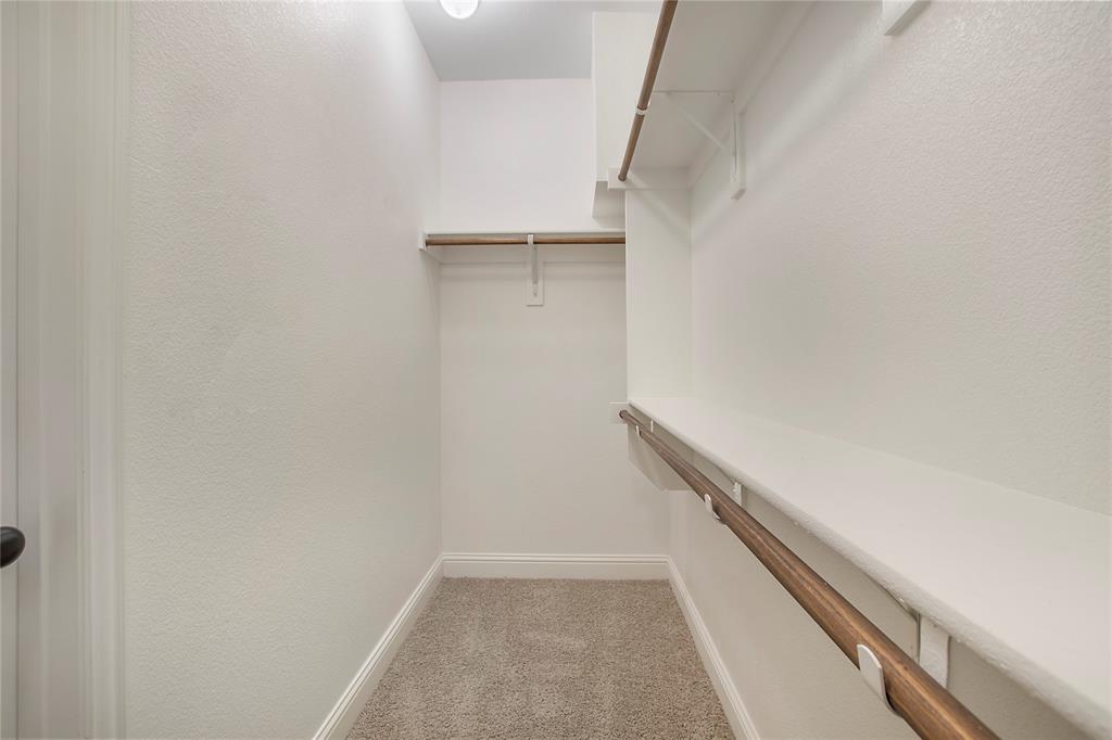 2811 Diamond Ridge Drive Arlington, TX 76001 - Photo 21 of 35 a view of an empty walk in closet